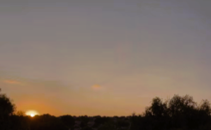 Peaceful summer sunset representing the beauty of ordinary moments.