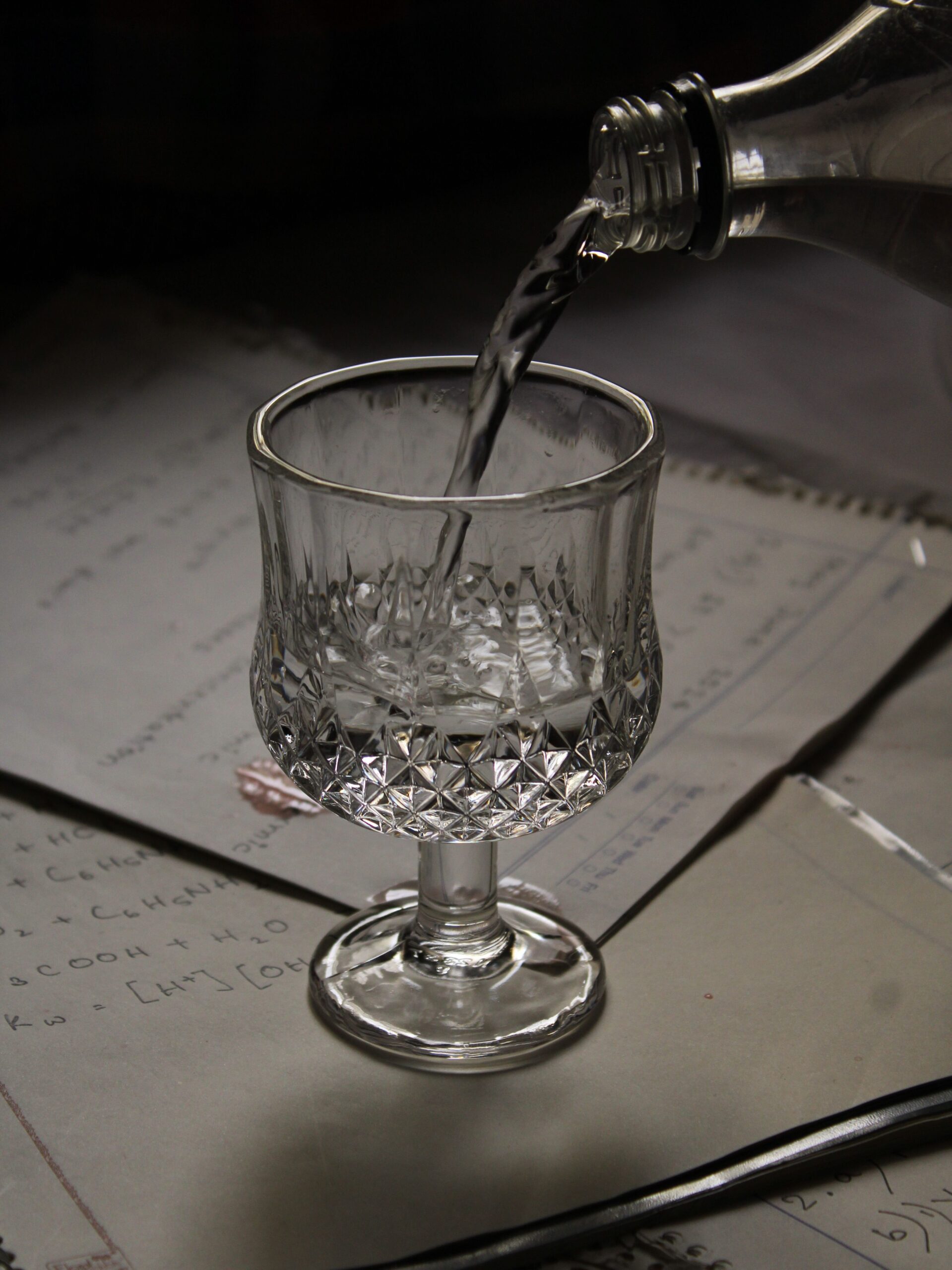 Glass of water in natural sunlight as a simple self-care habit for a better day