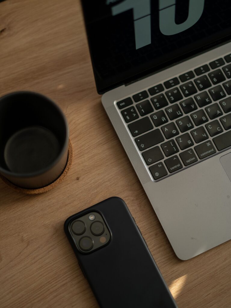 Minimal aesthetic workspace with journal, planner, and notes representing mid-year reset, goal setting, productivity, self improvement, motivation, and getting back on track for the second half of the year
